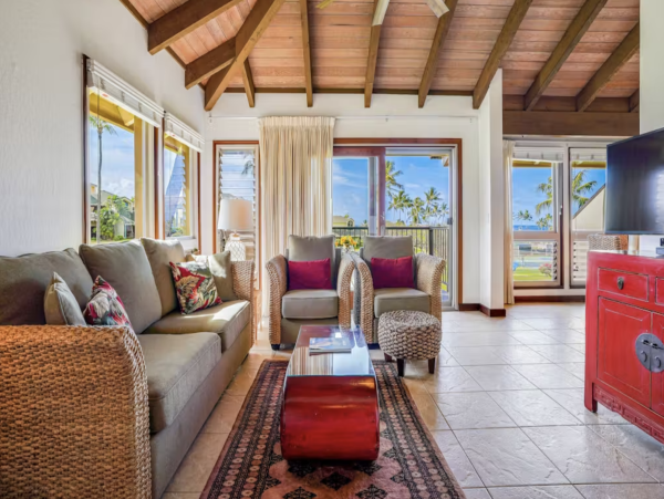 Luxury Poipu Kauai Vacation Rental  Ocean View Top-Floor Condo Near Brennecke’s Beach
